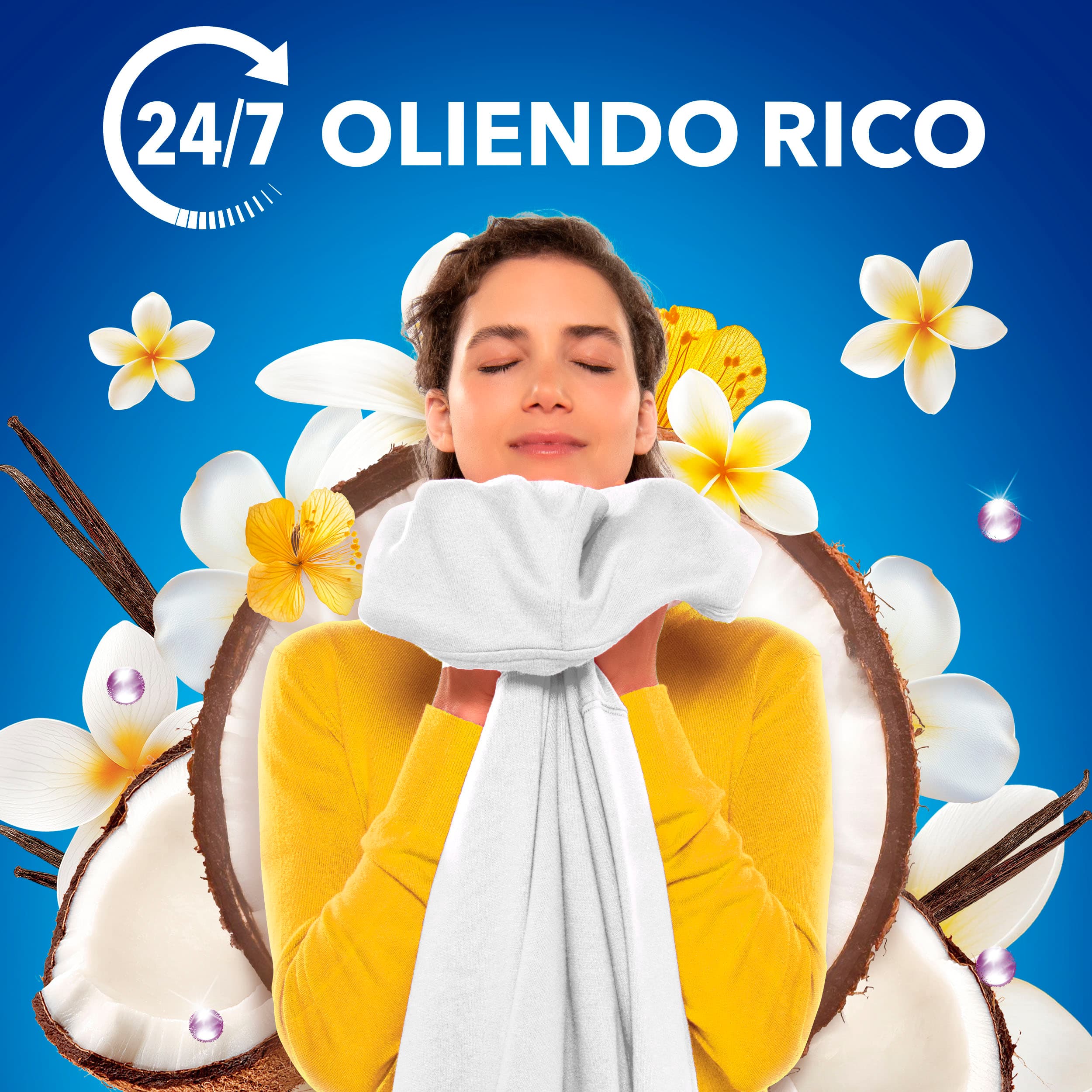Mulher cheirando uma toalha, com o claim 24/7 Oliendo Rico de Downy Intense Vanilla Bliss.